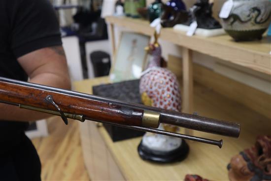 A 19th century Brown Bess-type flintlock musket, Jaipur Armoury, stamped JPR/EXR/ 336 length 142cm, restoration to stock